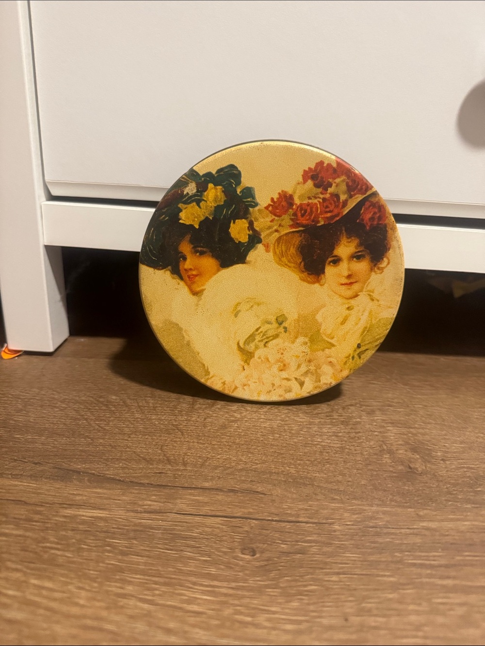 Source Unknown Yellow Floral Portrait Decorative Tin with Multi-Color Hats